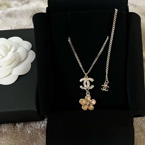 CHANEL
Enamel Crystal CC Camellia Pendant Necklace Beige Gold